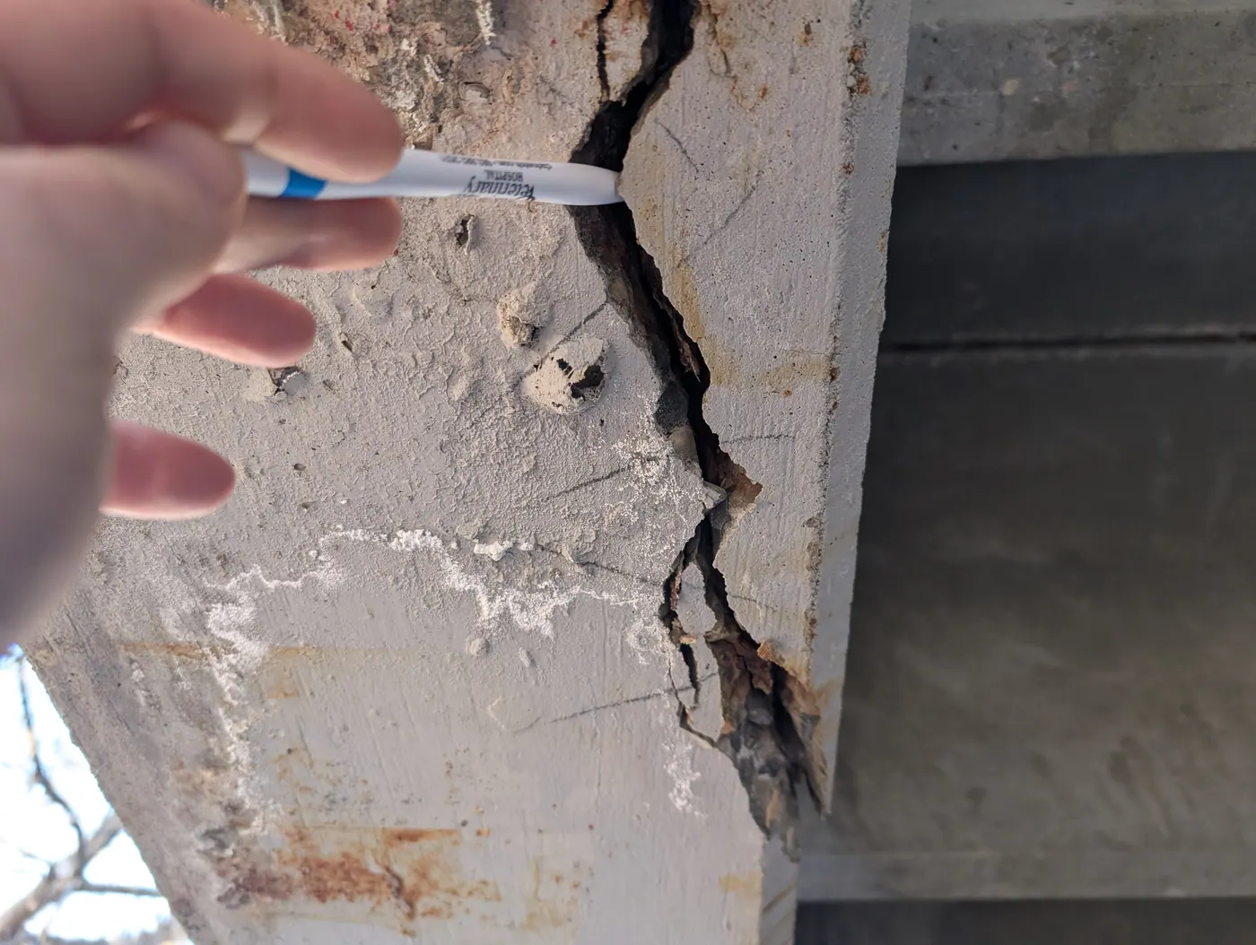 Measuring crack width on site — Crack width, pattern, and whether it is still moving are the questions that decide the repair